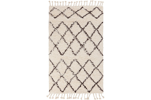 Simply timeless and beautifully on trend, this masterfully crafted moroccan style area rug is dressed to impress. Easy elegant and casually cool, it looks right at home whether your furnishings are classic or contemporary.100% wool | Handwoven | Plush pile | No backing; rug pad recommended | Spot clean | Imported