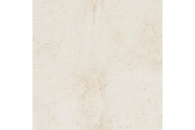 Take a walk on the wild side with this versatile 100% hand-crafted sheepskin rug. The luxurious fur is the ideal accent for any decor. Layer on the floor, the bed or the seat of a chair for an utterly indulgent effect.100% sheepskin | For indoor/outdoor use | Uv resistant; water resistant | Hand-crafted | Plush pile | No backing; rug pad recommended | Spot clean | Imported