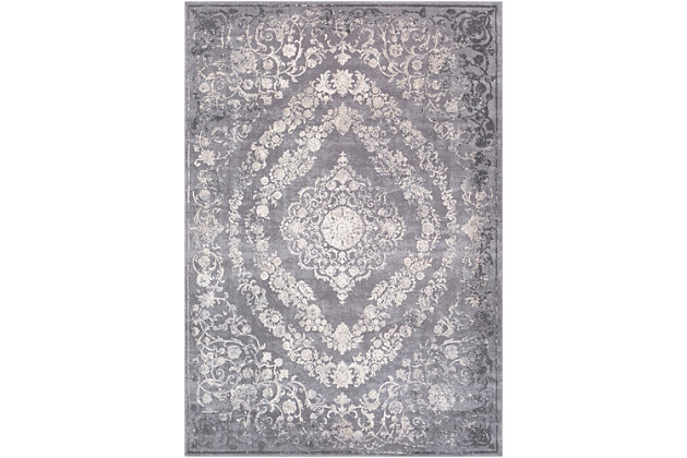 When your room needs a dash of color and pop of personality, this wonderfully versatile rug is just the ticket. Distressed, dyed effect softens the aesthetic for understated good looks that complement virtually any decor.Made of polyester and polypropylene | Machine woven | High pile/low pile | No backing; rug pad recommended | Spot clean | Imported