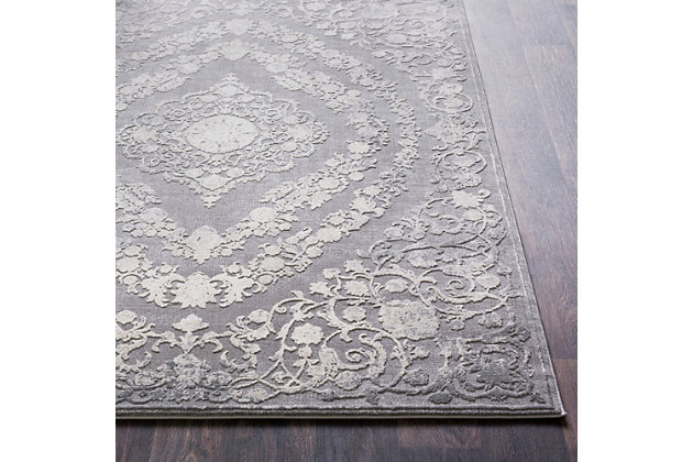 When your room needs a dash of color and pop of personality, this wonderfully versatile rug is just the ticket. Distressed, dyed effect softens the aesthetic for understated good looks that complement virtually any decor.Made of polyester and polypropylene | Machine woven | High pile/low pile | No backing; rug pad recommended | Spot clean | Imported