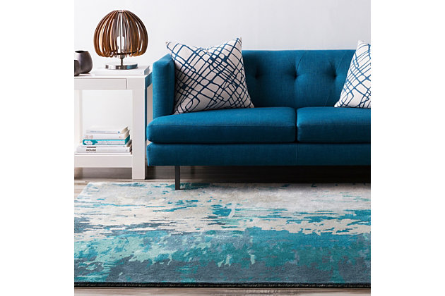 Striking abstract patterned rug leaves so much to the imagination. Its ethereal design dresses up a room with brilliant color, visual texture and a highly contemporary point of view.Made of wool/viscose | For indoor/outdoor use | Uv resistant; water resistant | Canvas backing | Hand-tufted | Imported | Spot clean only