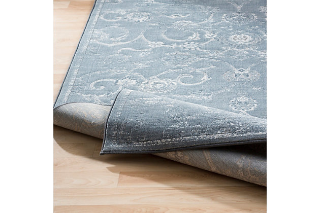 Need to warm up a room? The light and elegant feel of this rug is a lovely treat underfoot. Its flowing floral pattern blended with organic hues exudes a sense of ease that’s easy to love.Made of polypropylene | Machine made | No backing | Imported