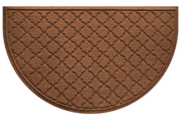 From the front entry to the back door, the Aqua Shield half round doormat provides a whole lot of peace of mind.  Beyond scraping dirt from shoes and paws, it’s got an exclusive “water dam” design for unbeatable absorbency. Resistant to the most extreme weather elements, this indoor-outdoor doormat is certified slip resistant by the National Floor Safety Institute. Talk about one heck of a welcome mat.100% polypropylene face is anti-static, quick drying and resistant to the most extreme weather elements, including intense sunlight | Synthetic rubber underside is certified slip-resistant by the national floor safety institute | Permanently molded design will not crush, mildew, mold, or rot | Exclusive 'water dam' raised border helps keep dirt and water in the mat, not on your floor | Aqua shield absorbs water and scrapes mud and dirt from shoes and paws to keep your entryway clean and dry | Absorbs 1 gallon of water per square yard | Suitable for indoor/outdoor use | Vacuum or hose clean, then hang to dry | Synthetic rubber backing is made with 25% recycled rubber | Made in the u.s.a.