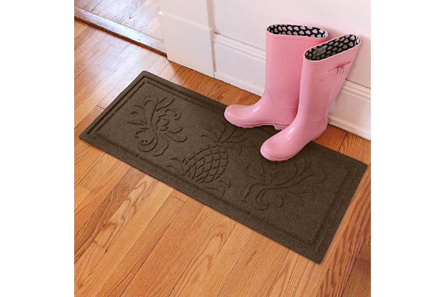 Give soiled soles and slippery floors the boot with the high-style, high-performance Aqua Shield boot tray doormat. Beyond scraping dirt from shoes, boots and paws, it’s got an exclusive “water dam” design for unbeatable absorbency. Resistant to the most extreme weather elements, this boot tray doormat is certified slip resistant by the National Floor Safety Institute—making it the ultimate way to go inside and out!100% polypropylene face is anti-static, quick drying and resistant to the most extreme weather elements, including intense sunlight | Permanently molded design will not crush, mildew, mold, or rot | Due to their high-low surface pattern, these waterhog boot trays scrape shoes and boots clean | Exclusive 'water dam' raised, rubber border helps keep dirt, water and snow in the mat, not on your floor | Absorbs 1.5 gallons of water per square yard | Suitable for indoor/outdoor use | Simply shake off, vacuum or hose clean, then hang to dry | Boot trays have 20% recycled content | Made in the u.s.a.