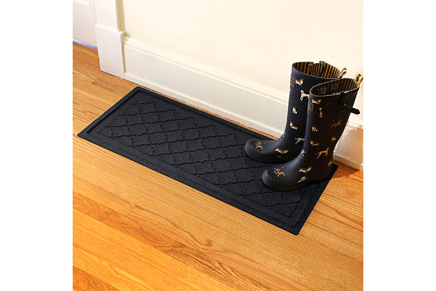 Give soiled soles and slippery floors the boot with the high-style, high-performance Aqua Shield boot tray doormat. Beyond scraping dirt from shoes, boots and paws, it’s got an exclusive “water dam” design for unbeatable absorbency. Resistant to the most extreme weather elements, this boot tray doormat is certified slip resistant by the National Floor Safety Institute—making it the ultimate way to go inside and out!100% polypropylene face is anti-static, quick drying and resistant to the most extreme weather elements, including intense sunlight | Permanently molded design will not crush, mildew, mold, or rot | Due to their high-low surface pattern, these waterhog boot trays scrape shoes and boots clean | Exclusive 'water dam' raised, rubber border helps keep dirt, water and snow in the mat, not on your floor | Absorbs 1.5 gallons of water per square yard | Suitable for indoor/outdoor use | Simply shake off, vacuum or hose clean, then hang to dry | Boot trays have 20% recycled content | Made in the u.s.a.