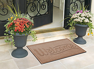 Say goodbye to tracked-in water and dirt and hello to high performance with the Aqua Shield doormat. Beyond scraping dirt from shoes and paws, this welcoming doormat has an exclusive “water dam” design for unbeatable absorbency. Resistant to the most extreme weather elements, this doormat is certified slip resistant by the National Floor Safety Institute—making it the ultimate way to go inside and out!100% polypropylene face is anti-static, quick drying and resistant to the most extreme weather elements, including intense sunlight | Synthetic rubber underside is certified slip-resistant by the national floor safety institute | Permanently molded design will not crush mildew, mold, or rot | Exclusive 'water dam' raised border helps keep dirt and water in the mat, not on your floor | Aqua shield absorbs water and scrapes mud and dirt from shoes and paws to keep your entryway clean and dry | Absorbs 1 gallon of water per square yard | Suitable for indoor/outdoor use | Vacuum or hose clean, then hang to dry | Synthetic rubber backing is made with 25% recycled rubber | Made in the u.s.a.