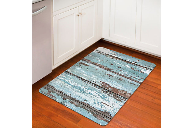 Whether you tend to put stress on your feet by the kitchen sink, washer/dryer, crafts table or workbench, the Aqua Shield comfort mat offers the leg up you’ve been longing for. Designed to make domestic life less of a chore and a lot more stylish, its feel-good, anti-fade face captures colors and graphics in near photographic quality. Slip resistant and machine washable, it’s sure to stand up beautifully over time.Woven polyester anti-fade face | 4-mil neoprene underside for comfort, support and slip resistance | Low profile will not gather under doors | Machine washable; line/air dry | Made in the u.s.a.