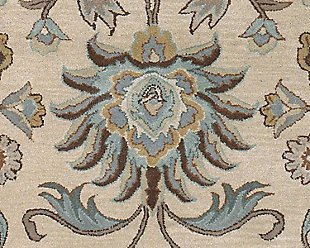 Whether adding warmth to contemporary settings or adorning traditional spaces, this alluring area rug, crafted of hand-tufted wool, is as beautiful as it as versatile. Soft and sophisticated, the designer palette in shades of cream, blue and brown is the essence of relaxed elegance.100% wool | For indoor/outdoor use | Uv resistant; water resistant | Hand-tufted, medium pile | Canvas backing | Imported | Spot clean only | Wool fibers are prone to shedding, vacuum regularly and shedding will subside