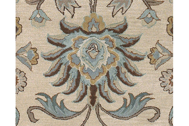 Whether adding warmth to contemporary settings or adorning traditional spaces, this alluring area rug, crafted of hand-tufted wool, is as beautiful as it as versatile. Soft and sophisticated, the designer palette in shades of cream, blue and brown is the essence of relaxed elegance.100% wool | For indoor/outdoor use | Uv resistant; water resistant | Hand-tufted, medium pile | Canvas backing | Imported | Spot clean only | Wool fibers are prone to shedding, vacuum regularly and shedding will subside