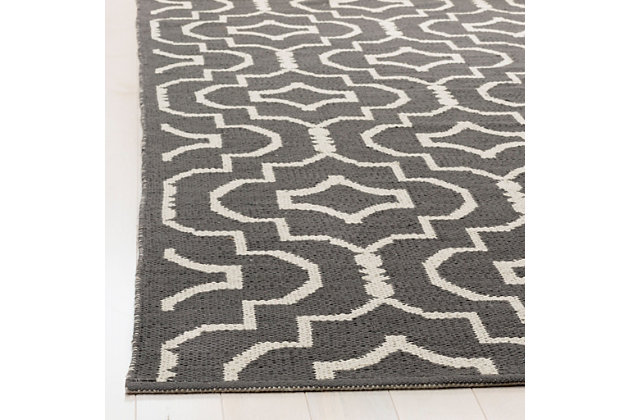 Simply timeless and beautifully on trend, this handwoven Moroccan style rug is dressed to impress. Easy elegant and casually cool, it looks right at home whether your furnishings are classic or contemporary.Made of cotton | Low profile | Rug pad recommended | Handwoven | Imported | Spot clean