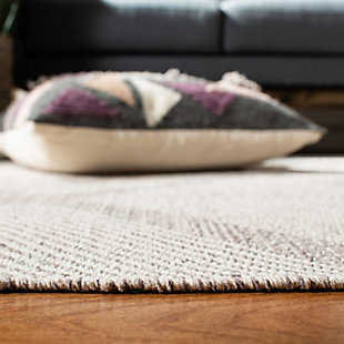 With its timeless trellis pattern, this easy-elegant area rug is right on trend. Whether your style is contemporary or classic, its simply chic aesthetic goes with the flow. Handwoven cotton weave is pure delight.Made of cotton | Low profile | Rug pad recommended | Handwoven | Imported | Spot clean