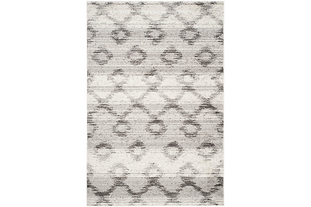 If tribal-inspired textiles speak to you, this alluring area rug is sure to translate beautifully in your space. With its soothing hues and overdyed effect, it's subtle yet so striking.Made of polypropylene | Medium pile | Rug pad recommended | Power loomed/machine made | Imported | Spot clean