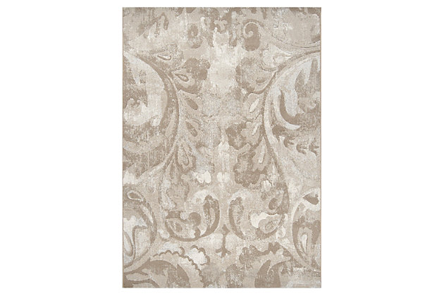 The art of subtlety is taken to a new level in this perfectly understated area rug with loads of possibilities. Carved woven details incorporate a rich textural element. Whispery soft hues in ivory, tan and gray are plenty pleasing. Indulge your senses in its soft high-low texture.100% polypropylene | Machine woven with carved detail | Medium pile | Imported | Dry clean