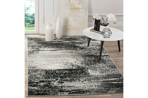 Why play it safe, when you can transform a space with big, bold and brilliant color? Saturated with deep, dramatic hues, this designer area rug stands out from the crowd for all the right reasons.Made of polypropylene | Medium pile | Rug pad recommended | Power loomed/machine made | Imported | Spot clean