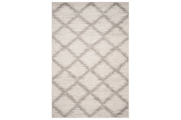 With its timeless trellis pattern design, this easy-elegant area rug is right on trend. Whether your style is contemporary or classic, its simply chic aesthetic goes with the flow.Made of  polypropylene | Machine woven | Medium pile | No backing; rug pad recommended | Spot clean | Imported