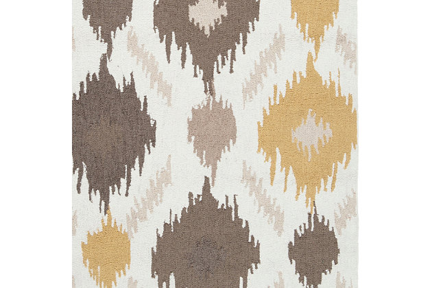 Bring a sense of drama and a touch of pizzazz to your space with this designer area rug. Energizing ikat pattern is tempered with a warm, sophisticated palette for beautiful balance. Tight knobby weave incorporates artisan quality and a textural look and feel.100% polyester | Hand-hooked, low pile | Cotton canvas backing; rug pad recommended | Imported | Dry clean