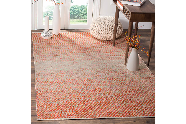 When your room needs a dash of color and pop of personality, this wonderfully versatile rug is just the ticket. Distressed, dyed effect softens the aesthetic for understated good looks that complement virtually any decor.Made of cotton | Handmade | Low profile | No backing; rug pad recommended | Spot clean | Imported