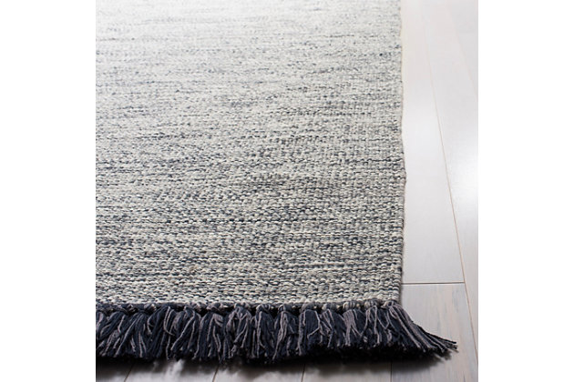 Master the art of casually cool living with this richly styled rag rug. Loaded with texture and perfectly imperfect personality, it's sure to infuse a relaxed sensibility that feels like home sweet home.Made of cotton | Handmade | Low profile | No backing; rug pad recommended | Spot clean | Imported