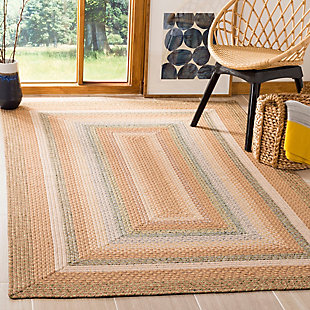 Talk about blending in yet standing out. While decidedly simple, this multitonal braided rug is wonderfully complex upon closer inspection. If you’re looking for colorful inspiration, you’ll love its host of hues. Exuding an easy-elegant sensibility, this versatile area rug works equally well in formal places and casually cool spaces.Made of polypropylene | Handmade | Low profile | Latex backing prevents rug from moving | Spot clean | Imported