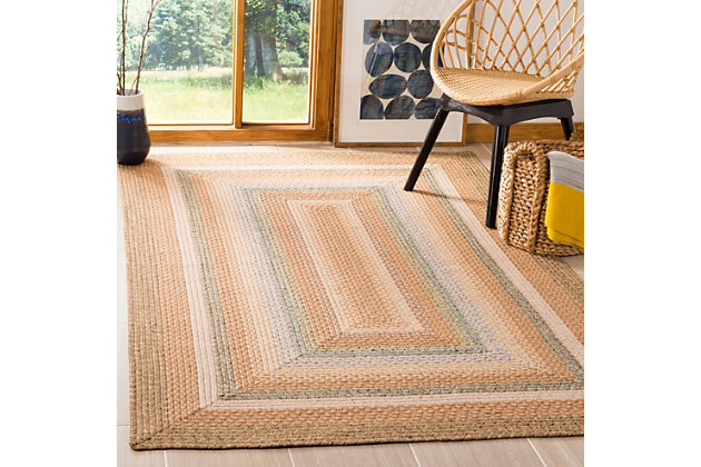 Talk about blending in yet standing out. While decidedly simple, this multitonal braided rug is wonderfully complex upon closer inspection. If you’re looking for colorful inspiration, you’ll love its host of hues. Exuding an easy-elegant sensibility, this versatile area rug works equally well in formal places and casually cool spaces.Made of polypropylene | Handmade | Low profile | Latex backing prevents rug from moving | Spot clean | Imported