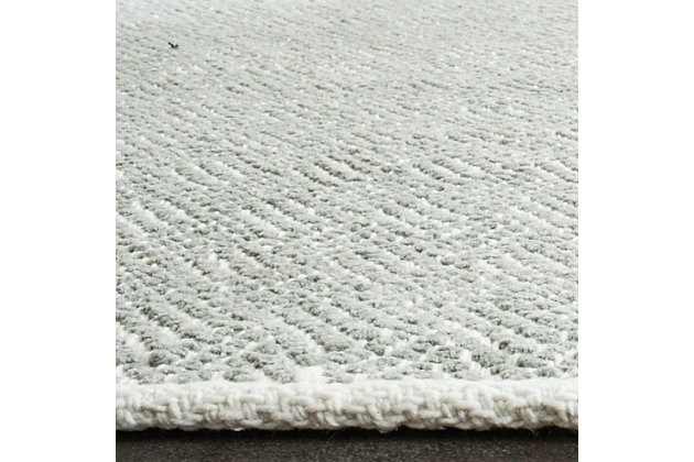 The handwoven beauty of flatweave rugs is a homespun staple in homes from coastal to contemporary. A low-profile design ensures an easy fit under furniture while soft cotton construction keeps it comfy underfoot.Made of cotton | Handmade | Low profile | No backing; rug pad recommended | Spot clean | Imported
