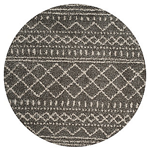 Indulge in retro revival with this sumptuous shag rug with subtle tribal design. Plush pile is loaded with fun, feel-good texture. Harmonious hues make it a tasteful choice for so many spaces.Made of  polypropylene | Machine woven | Medium pile | No backing; rug pad recommended | Spot clean | Imported