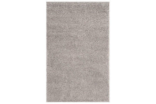 Indulge in retro revival with this sumptuous shag rug. Plush pile is loaded with fun, feel-good texture. Harmonious hues make it a tasteful choice for so many spaces.Made of  polypropylene | Machine woven | Medium pile | No backing; rug pad recommended | Spot clean | Imported
