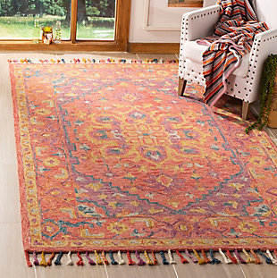 What a footloose and fancy-free feeling this rug brings to your living space. Boho-chic rug is cool and creative. Handmade craftsmanship and intricate patterns add a strikingly exotic aesthetic to your space.Made of wool | Handmade | Low pile | Cotton backing; rug pad recommended | Spot clean | Imported