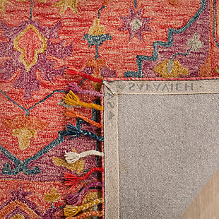 What a footloose and fancy-free feeling this rug brings to your living space. Boho-chic rug is cool and creative. Handmade craftsmanship and intricate patterns add a strikingly exotic aesthetic to your space.Made of wool | Handmade | Low pile | Cotton backing; rug pad recommended | Spot clean | Imported