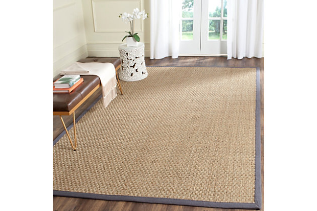 For sophisticated beach house style, this seagrass rug is the perfect choice. Natural fiber rugs are soft underfoot, textural and woven from sustainably harvested sisal for an elegant cottage look with feel-good appeal.Made of seagrass with cotton border | Machine made | Low pile | Latex backing; rug pad recommended | Spot clean | Imported