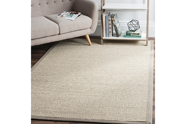 For sophisticated beach house style, this sisal rug is the perfect choice. Natural fiber rugs are soft underfoot, textural and woven from sustainably harvested sisal for an elegant cottage look with feel-good appeal.Made of sisal | Machine made | Low pile | Latex backing; rug pad recommended | Spot clean | Imported
