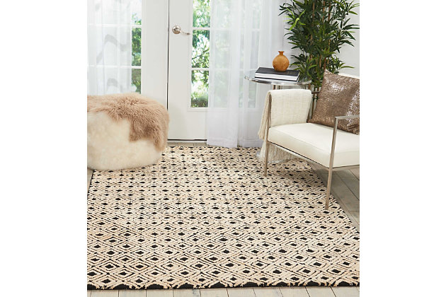 Dress up any floor with the natural hue and designer look of this hand-tufted rug. It welcomes visitors with warmth and comfort underfoot. Neutral color palette exudes a marvelously modern vibe which works wonders in any setting.Made of polyester | Hand-tufted | Rug pad recommended | High-low pile | Imported | Stain and fade resistant | Spot clean