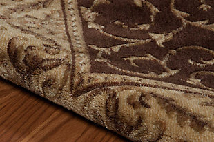 Merging symmetry with an organic sense of flow, this rug with hand-carved detailing is out of this world in terms of tone and texture. Classic border design provides such rich shade variation, taking your floors to a whole new level.Made of polypropylene/acrylic | Machine woven | Rug pad recommended | Hand-carved accents | Imported | Spot clean
