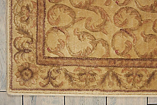 Merging symmetry with an organic sense of flow, this rug with hand-carved detailing is out of this world in terms of tone and texture. Classic border design provides such rich shade variation, taking your floors to a whole new level.Made of polypropylene/acrylic | Machine woven | Rug pad recommended | Hand-carved accents | Imported | Spot clean
