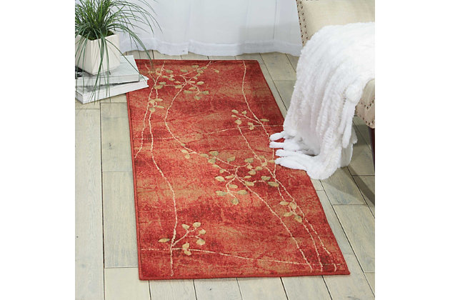 Looking to liven a room? This designer area rug provides the fresh take on floral you've been longing for. Its flowing pattern and organic hues exude a sense of ease that’s easy to love.Made of polypropylene/acrylic | Machine woven | Latex backing; rug pad recommended | Hand-carved accents | Imported | Spot clean