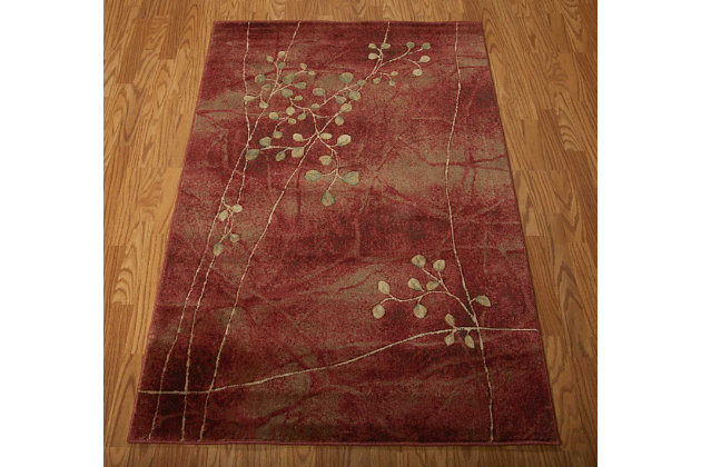 Looking to liven a room? This designer area rug provides the fresh take on floral you've been longing for. Its flowing pattern and organic hues exude a sense of ease that’s easy to love.Made of polypropylene/acrylic | Machine woven | Latex backing; rug pad recommended | Hand-carved accents | Imported | Spot clean