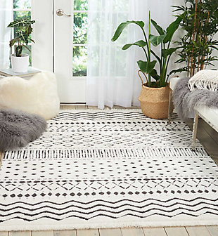 Simply timeless and beautifully on trend, this masterfully crafted moroccan style area rug is dressed to impress. Easy elegant and casually cool, it looks right at home whether your furnishings are retro, boho or somewhere in between.Made of polypropylene/polyester | Machine woven | Cut pile | Latex backing; rug pad recommended | Imported | Spot clean