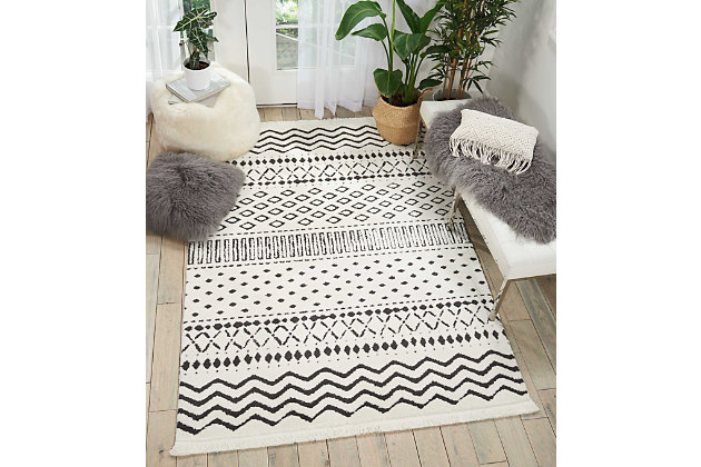 Simply timeless and beautifully on trend, this masterfully crafted moroccan style area rug is dressed to impress. Easy elegant and casually cool, it looks right at home whether your furnishings are retro, boho or somewhere in between.Made of polypropylene/polyester | Machine woven | Cut pile | Latex backing; rug pad recommended | Imported | Spot clean