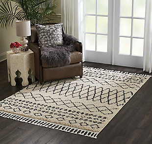 Simply timeless and beautifully on trend, this masterfully crafted moroccan style area rug is dressed to impress. Easy elegant and casually cool, it looks right at home whether your furnishings are retro, boho or somewhere in between.Made of polypropylene | Machine woven | Shag pile, low shedding | Imported | Spot clean