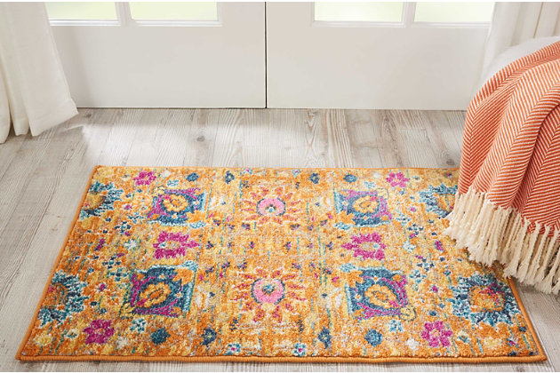 Looking to liven a room? This designer area rug provides the fresh take on floral you've been longing for. Its flowing pattern and organic hues exude a sense of ease that’s easy to love.Made of polpropylene | Machine woven | Cut pile, low shedding | Jute backing | Imported | Spot clean