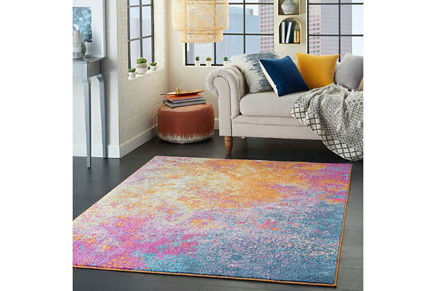 Striking abstract patterned rug leaves so much to the imagination. Its ethereal design dresses up a room with glamourously gradated shades, visual texture and a highly contemporary point of view.Made of polpropylene | Machine woven | Cut pile, low shedding | Jute backing | Imported | Spot clean