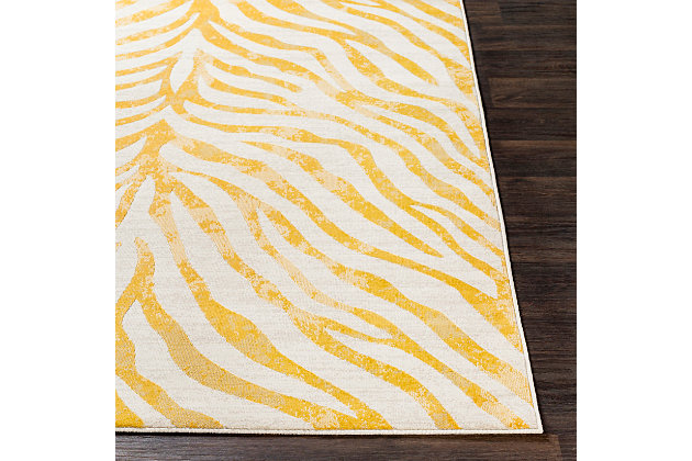 Go wild—within reason—with this subtle animal print area rug. Thanks to its neutral color palette, this area rug plays nicely with other hues and can easily be placed on top of carpet or a natural-tone sisal rug for a layered look.Made of polypropylene | Machine woven | Medium pile | Imported | Spot clean only
