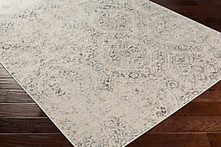 When your room needs just a wisp of color and major designer flair, this wonderfully versatile area rug is just the ticket. Distressed effect softens the aesthetic for understated good looks that complement virtually any decor.Made of polypropylene | Machine woven | Medium pile | Rug pad recommended | No backing | Spot clean recommended | Imported