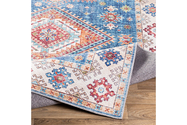 Classic design elements create a fabulous flatweave rug that's timeless in elegance and universal in appeal. Posh palette and distinctive pattern clearly reflect your good taste.Made of polyester | No pile | Imported | Spot clean recommended