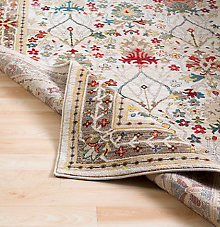 Merging symmetry with an organic sense of flow, this rug is out of this world in terms of tone and texture. Classic border design provides such rich shade variation, taking your floors to a whole new level.Made of polypropylene | Machine woven | Medium pile | Rug pad recommended | Spot clean recommended | Imported