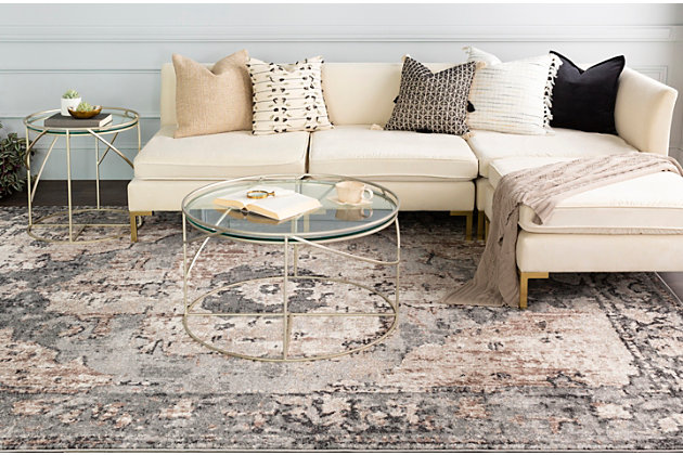 Classic design elements create a rug that's timeless in elegance and universal in appeal. Posh palette and distinctive pattern clearly reflect your good taste.Made of polypropylene | Machine woven | Medium pile | Rug pad recommended | Spot clean recommended | Imported