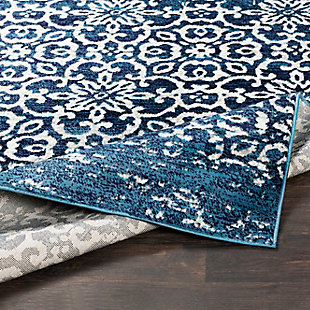 Why play it safe, when you can transform a space with big, bold and brilliant color? Saturated with deep, dramatic hues, this designer area rug stands out from the crowd for all the right reasons.Made of polypropylene | Machine woven | Medium pile | Rug pad recommended | Spot clean recommended | Imported