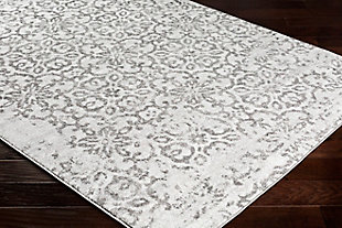 Dress up any floor with the natural hue and designer look of this rug. It welcomes visitors with warmth and comfort underfoot. Neutral color palette exudes a marvelously modern vibe which works wonders in any setting.Made of polypropylene | Machine woven | Medium pile | Rug pad recommended | Spot clean recommended | Imported