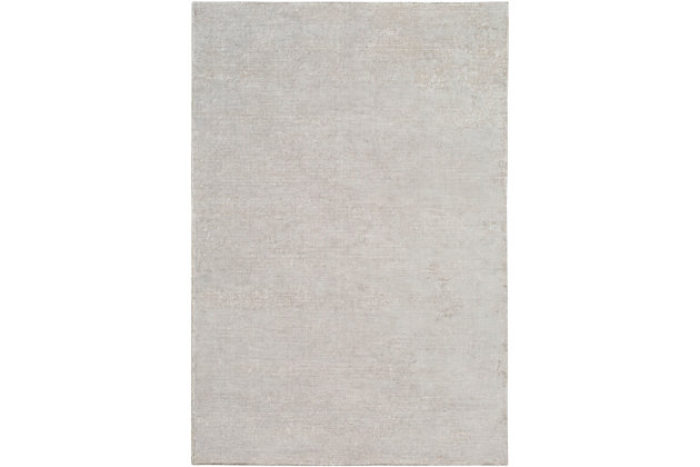 Dress up any floor with the natural hue and designer look of this rug. It welcomes visitors with warmth and comfort underfoot. Neutral color palette exudes a soothing sensibility which works wonders in any setting.Made of tencel and nylon | Hand-loomed | Low pile | Rug pad recommended | Imported | Spot clean only