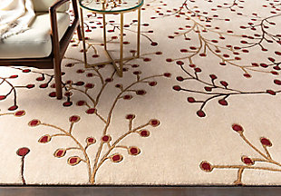 Looking to liven a room? This designer area rug provides the fresh take on floral you've been longing for. Its flowing pattern and organic hues exude a sense of ease that’s easy to love.Made of wool | Hand-tufted | Medium pile | Canvas backing; rug pad recommended | Wool fibers are prone to shedding, vacuum regularly and shedding will subside | Imported | Spot clean only